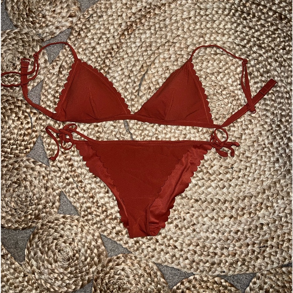 Cute scalloped edge two piece bathing suit.